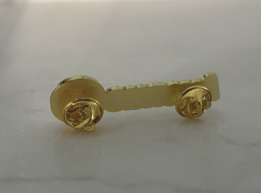 The Avenue Z Gold Pin